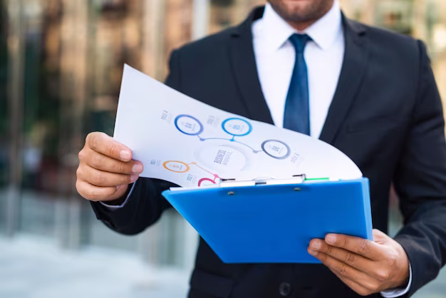 front-view-business-man-looking-charts