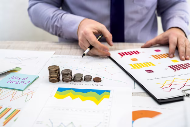 office-businessman-working-analyzing-company-profits-using-charts-documents-using-coins-business-analysis-strategy